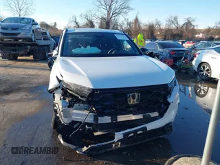 2025 Honda CR-V Sport-L with VIN 7FARS6H84SE053534, listed as a IAAI auction lot 41587207 with 2,427 mi miles and . Bid and sale history available at DreamBid. Image 12.