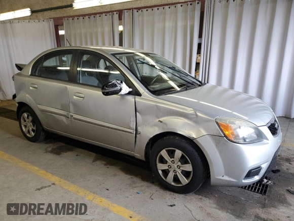 2010 Kia Rio LX with VIN KNADH4A34A6643716, listed as a Copart auction lot 46880375 with 112,265 mi miles and Salvage Title. Bid and sale history available at carsss.com. Image 4.
