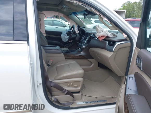 2020 Chevrolet Tahoe LT with VIN 1GNSCBKC4LR181887, listed as a IAAI auction lot 42160821 with 106,757 mi miles and . Bid and sale history available at DreamBid. Image 5.