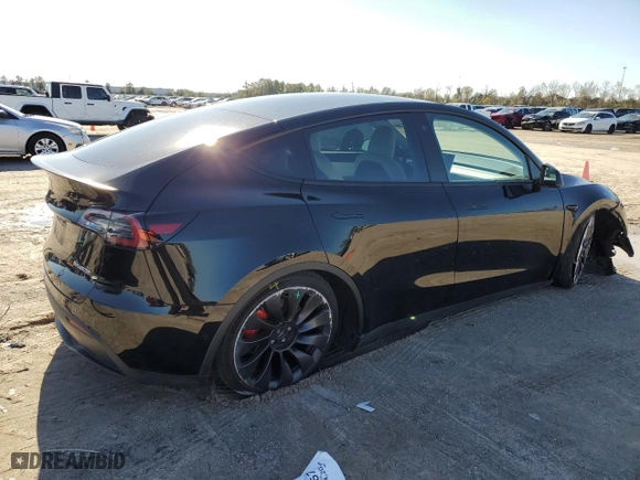 2022 Tesla Model Y Performance with VIN 7SAYGDEF5NF337004, listed as a Copart auction lot 85801004 with 24,945 mi miles and Salvage Title. Bid and sale history available at carsss.com. Image 3.