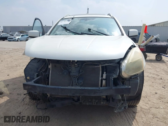 2013 Nissan Rogue S with VIN JN8AS5MV7DW104560, listed as a IAAI auction lot 41792395 with 104,201 mi miles and . Bid and sale history available at DreamBid. Image 13.