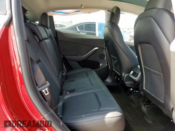 2024 Tesla Model Y Long Range with VIN 7SAYGDEE5RA235910, listed as a Copart auction lot 60988605 with 23,882 mi miles and Salvage title. Bid and sale history available at DreamBid. Image 11.