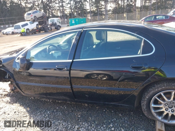 2002 Chrysler 300M M with VIN 2C3HE66G22H155440, listed as a IAAI auction lot 41517230 with 144,269 mi miles and . Bid and sale history available at DreamBid. Image 15.