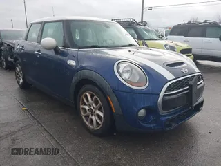 2015 MINI Hardtop 4 Door S z VIN WMWXU3C58FT892238, wystawiony jako IAAI lot #41104432 z przebiegiem 156 722 mil mil oraz . Historia ofert i sprzedaży dostępna na DreamBid. Obrazek 1.