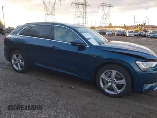 2019 Audi e-tron Prestige with VIN WA1VABGE0KB011579, listed as a IAAI auction lot 41027812 with 41,549 mi miles and . Bid and sale history available at DreamBid. Image 1.