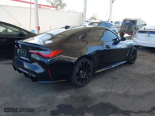 2023 BMW M4 Competition with VIN WBS33AZ00PCL63199, listed as a IAAI auction lot 41917337 with 37,786 mi miles. Bid and sale history available at carsss.com. Image 4.