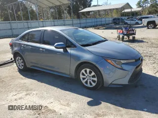 2023 Toyota Corolla LE with VIN JTDB4MEE1P3009369, listed as a Copart auction lot 43608735 with 52,551 mi miles and Salvage Title. Bid and sale history available at carsss.com. Image 4.