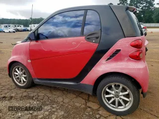 2009 Smart fortwo Pure with VIN WMEEJ31X79K271222, listed as a Copart auction lot 64583695 with 152,626 mi miles and Clean title. Bid and sale history available at DreamBid. Image 2.
