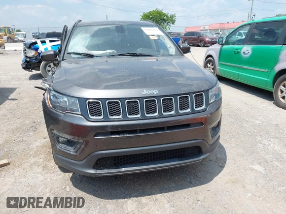 2019 Jeep Compass Latitude with VIN 3C4NJCBB1KT833007, listed as a IAAI auction lot 42401265 with 106,973 mi miles and . Bid and sale history available at DreamBid. Image 12.