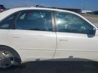 2004 Toyota Avalon XL z VIN 4T1BF28BX4U343188, wystawiony jako IAAI lot #42163107 z przebiegiem Nie podano mil oraz . Historia ofert i sprzedaży dostępna na DreamBid. Obrazek 13.