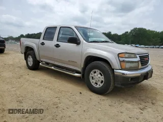 2005 GMC Canyon 1SF SLE Z71 z VIN 1GTDT136058213750, wystawiony jako Copart lot #57111175 z przebiegiem 84 552 mil mil oraz Czysty tytuł • Clean title. Historia ofert i sprzedaży dostępna na DreamBid. Obrazek 4.