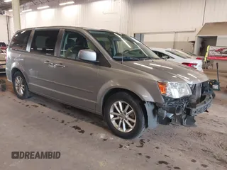 2013 Dodge Grand Caravan SXT with VIN 2C4RDGCG8DR687639, listed as a IAAI auction lot 41277348 with 126,128 mi miles and . Bid and sale history available at DreamBid. Image 1.