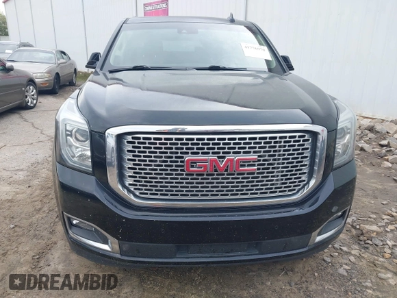 2016 GMC Yukon XL Denali with VIN 1GKS2HKJ2GR128323, listed as a IAAI auction lot 41776970 with 179,270 mi miles and . Bid and sale history available at carsss.com. Image 12.