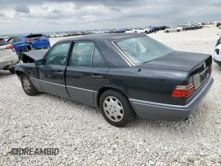 1994 Mercedes-Benz E Class with VIN WDBEA32EXRC074761, listed as a Copart auction lot 70322754 with 0 mi miles and Salvage Title. Bid and sale history available at carsss.com. Image 2.