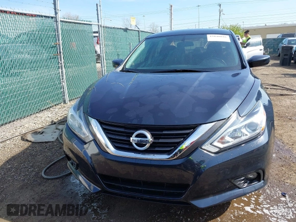 2016 Nissan Altima SR with VIN 1N4AL3AP1GC204703, listed as a IAAI auction lot 42040016 with 88,304 mi miles and . Bid and sale history available at DreamBid. Image 12.