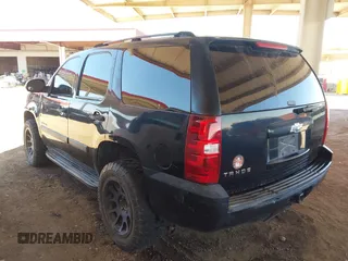 2007 Chevrolet Tahoe LS with VIN 1GNFC13C07R266418, listed as a IAAI auction lot 42435750 with 321,712 mi miles and . Bid and sale history available at DreamBid. Image 3.