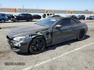 2014 BMW M6 z VIN WBSLZ9C53EDZ78743, wystawiony jako Copart lot #60601215 z przebiegiem 89 073 mil mil oraz Szkoda całkowita • Salvage title. Historia ofert i sprzedaży dostępna na DreamBid. Obrazek 1.