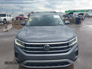 2022 Volkswagen Atlas SE z VIN 1V2JR2CA4NC529787, wystawiony jako IAAI lot #42051211 z przebiegiem 55 787 mil mil oraz . Historia ofert i sprzedaży dostępna na DreamBid. Obrazek 6.