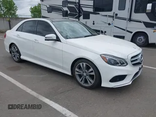 2015 Mercedes-Benz E 350 Sport with VIN WDDHF5KB1FB145337, listed as a IAAI auction lot 42137791 with 104,713 mi miles and . Bid and sale history available at DreamBid. Image 1.