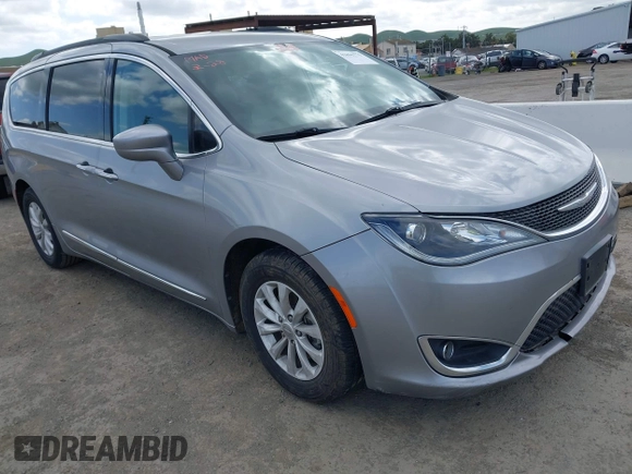 2017 Chrysler Pacifica Touring L with VIN 2C4RC1BG1HR803027, listed as a IAAI auction lot 41896775 with 112,896 mi miles and . Bid and sale history available at DreamBid. Image 1.