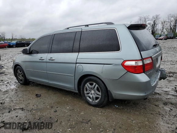 2007 Honda Odyssey EX-L with VIN 5FNRL38607B011150, listed as a Copart auction lot 51811195 with 218,189 mi miles and Salvage Title. Bid and sale history available at carsss.com. Image 2.