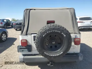 1997 Jeep Wrangler SE with VIN 1J4FY29PXVP411817, listed as a Copart auction lot 48755615 with 125,284 mi miles and Salvage Title. Bid and sale history available at DreamBid. Image 6.