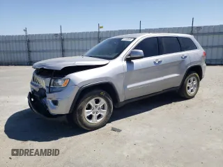 2016 Jeep Grand Cherokee Laredo with VIN 1C4RJEAGXGC358910, listed as a Copart auction lot 61499455 with 86,054 mi miles and Salvage title. Bid and sale history available at DreamBid. Image 1.