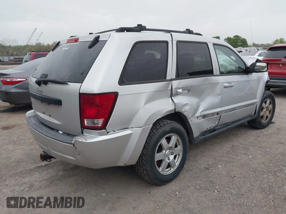 2009 Jeep Grand Cherokee Laredo with VIN 1J8GR48K09C557139, listed as a IAAI auction lot 41994604 with 1 mi miles. Bid and sale history available at carsss.com. Image 4.
