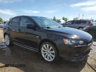 2009 Mitsubishi Lancer z VIN JA3AX88W99U613116, wystawiony jako Copart lot #58765855 z przebiegiem 256 289 mil mil oraz Czysty tytuł • Clean title. Historia ofert i sprzedaży dostępna na DreamBid. Obrazek 4.