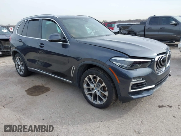 2019 BMW X5 xDrive40i with VIN 5UXCR6C59KLL08488, listed as a IAAI auction lot 41724824 with 57,334 mi miles. Bid and sale history available at carsss.com. Image 1.