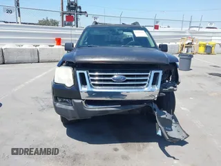 2007 Ford Explorer Sport Trac XLT z VIN 1FMEU31K17UA01300, wystawiony jako IAAI lot #42321378 z przebiegiem 221 813 mil mil oraz . Historia ofert i sprzedaży dostępna na DreamBid. Obrazek 6.