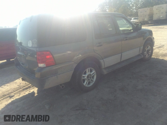2004 Ford Expedition XLT with VIN 1FMPU16W64LA01397, listed as a IAAI auction lot 41494738 with 214,192 mi miles. Bid and sale history available at carsss.com. Image 4.