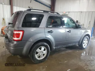 2012 Ford Escape XLT z VIN 1FMCU9DG8CKA93402, wystawiony jako Copart lot #62266845 z przebiegiem 196 779 mil mil oraz Szkoda całkowita • Salvage title. Historia ofert i sprzedaży dostępna na DreamBid. Obrazek 3.