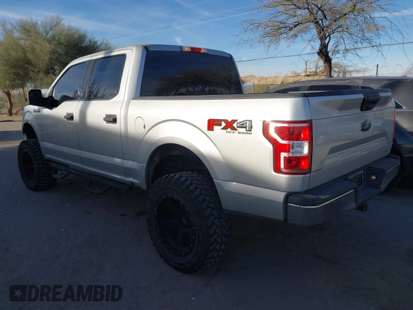 2019 Ford F-150 XL with VIN 1FTEW1E43KKE23264, listed as a IAAI auction lot 41395865 with 106,898 mi miles. Bid and sale history available at carsss.com. Image 3.