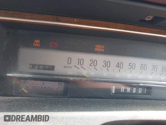 1990 Mercury Grand Marquis z VIN 2MECM74F9LX614526, wystawiony jako IAAI lot #42068697 z przebiegiem 4 875 mil mil oraz . Historia ofert i sprzedaży dostępna na DreamBid. Obrazek 7.