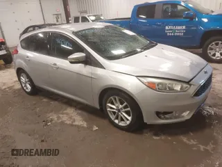 2015 Ford Focus SE with VIN 1FADP3K29FL328611, listed as a IAAI auction lot 41669844 with 136,666 mi miles. Bid and sale history available at carsss.com. Image 1.