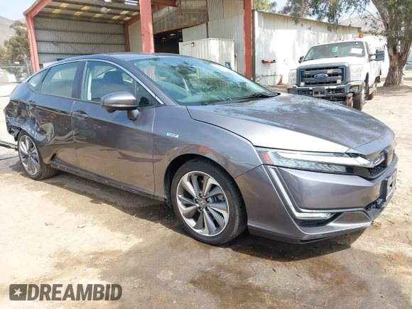 2018 Honda Clarity with VIN JHMZC5F12JC013732, listed as a IAAI auction lot 42157758 with 162,470 mi miles. Bid and sale history available at carsss.com. Image 1.