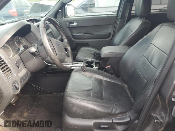 2012 Ford Escape Limited z VIN 1FMCU0EG1CKB30638, wystawiony jako Copart lot #52905205 z przebiegiem 169 683 mil mil oraz Szkoda całkowita • Salvage title. Historia ofert i sprzedaży dostępna na DreamBid. Obrazek 7.