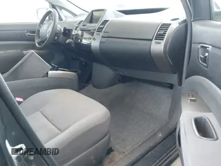 2007 Toyota Prius z VIN JTDKB20UX73281542, wystawiony jako IAAI lot #42449989 z przebiegiem 164 111 mil mil oraz . Historia ofert i sprzedaży dostępna na DreamBid. Obrazek 5.