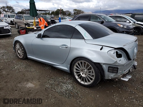 2005 Mercedes-Benz SLK-Class 5.5L AMG with VIN WDBWK73F85F069874, listed as a Copart auction lot 48748865 with 79,391 mi miles and Salvage Title. Bid and sale history available at carsss.com. Image 2.