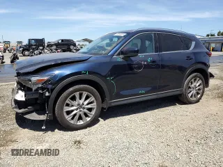 2020 Mazda CX-5 Grand Touring with VIN JM3KFADM4L0794765, listed as a Copart auction lot 63850005 with 53,270 mi miles and Salvage title. Bid and sale history available at DreamBid. Image 1.
