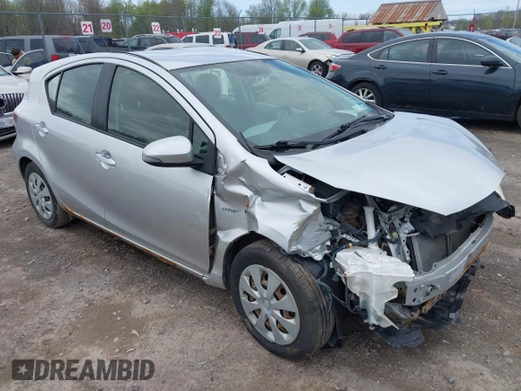 2012 Toyota Prius One z VIN JTDKDTB31C1515979, wystawiony jako IAAI lot #42113818 z przebiegiem 184 528 mil mil oraz . Historia ofert i sprzedaży dostępna na DreamBid. Obrazek 1.