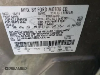 2013 Ford Edge Limited z VIN 2FMDK4KC8DBA83316, wystawiony jako Copart lot #58051895 z przebiegiem 158 795 mil mil oraz Szkoda całkowita • Salvage title. Historia ofert i sprzedaży dostępna na DreamBid. Obrazek 12.
