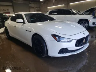 2014 Maserati Ghibli S Q4 with VIN ZAM57RTA4E1117703, listed as a Copart auction lot 48754515 with 104,284 mi miles and Salvage Title. Bid and sale history available at carsss.com. Image 4.