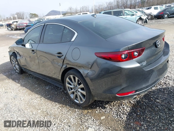 2023 Mazda 3 S Premium with VIN 3MZBPBDM8PM373434, listed as a IAAI auction lot 41234729 with 9,387 mi miles and . Bid and sale history available at DreamBid. Image 3.