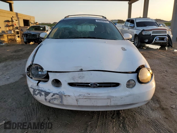 1999 Ford Taurus SE z VIN 1FAFP58S3XG308764, wystawiony jako Copart lot #43959225 z przebiegiem 120 936 mil mil oraz Szkoda całkowita • Salvage title. Historia ofert i sprzedaży dostępna na DreamBid. Obrazek 5.