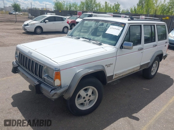 1992 Jeep Cherokee with VIN 1J4FJ58S0NL102716, listed as a IAAI auction lot 42169406 with 197,167 mi miles and . Bid and sale history available at DreamBid. Image 2.