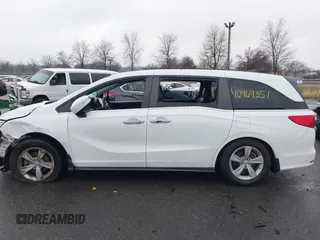 2020 Honda Odyssey EX-L with VIN 5FNRL6H78LB031411, listed as a IAAI auction lot 41027726 with 55,586 mi miles. Bid and sale history available at carsss.com. Image 14.