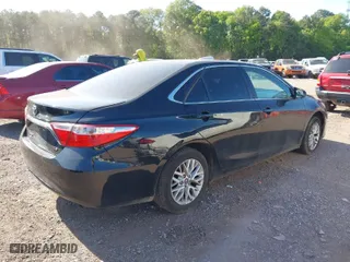 2016 Toyota Camry XLE with VIN 4T4BF1FK8GR584657, listed as a IAAI auction lot 41994436 with 212,401 mi miles. Bid and sale history available at carsss.com. Image 4.