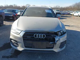 2017 Audi Q3 Premium Plus with VIN WA1JCCFS5HR011907, listed as a IAAI auction lot 41675496 with 102,591 mi miles. Bid and sale history available at carsss.com. Image 12.